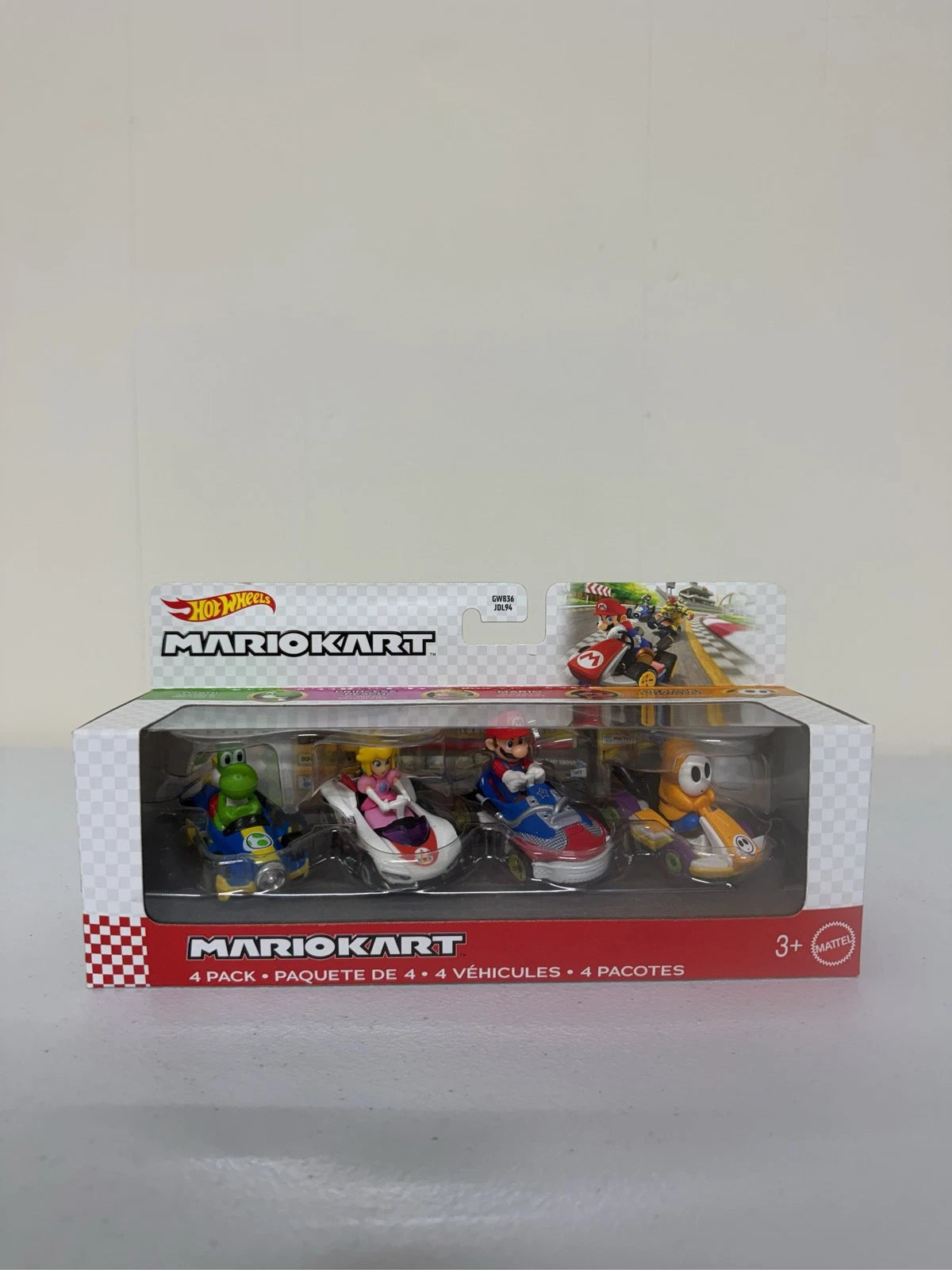 Hot Wheels Mario Kart 4-Pack: Yoshi, Peach, Mario, Orange Shy Guy